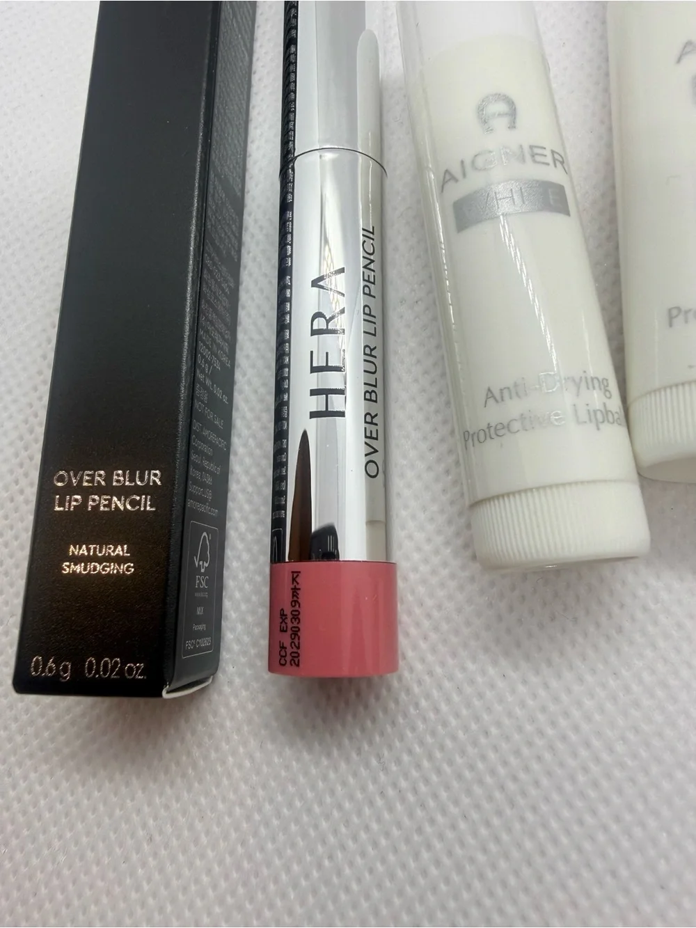 Mixed Lip Product Bundle: Lipstick, Gloss, Balm, Pencil - HERA, Uriage +